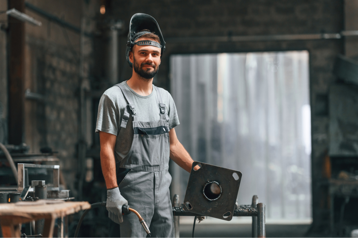 Welder on the job in trade