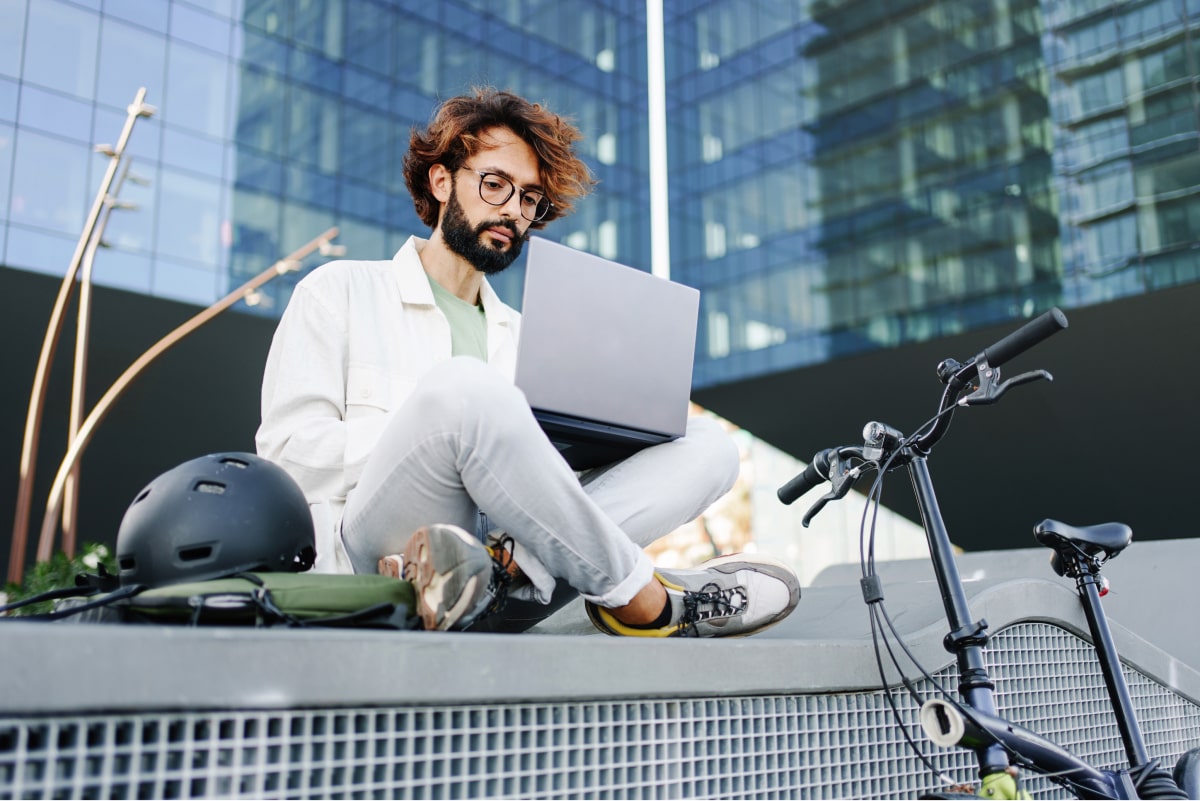 highly paid tech worker on laptop